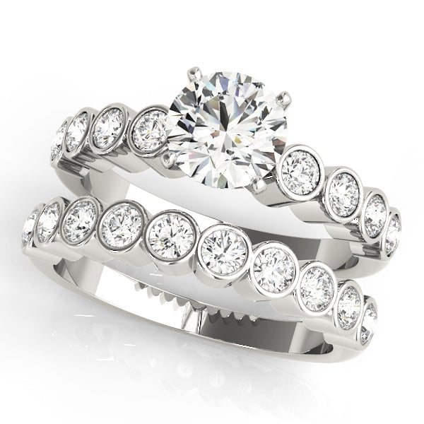 ENGAGEMENT RINGS SINGLE ROW BEZEL SET