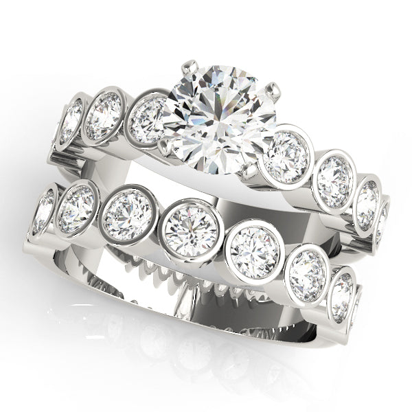 ENGAGEMENT RINGS SINGLE ROW BEZEL SET